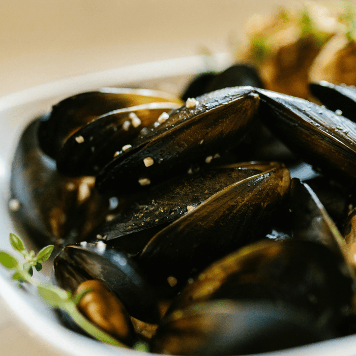 Mussels with herbs and beer on a HOT WOK - HOT WOK
